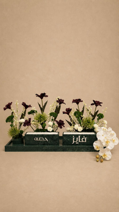 Couples candles with arrangement