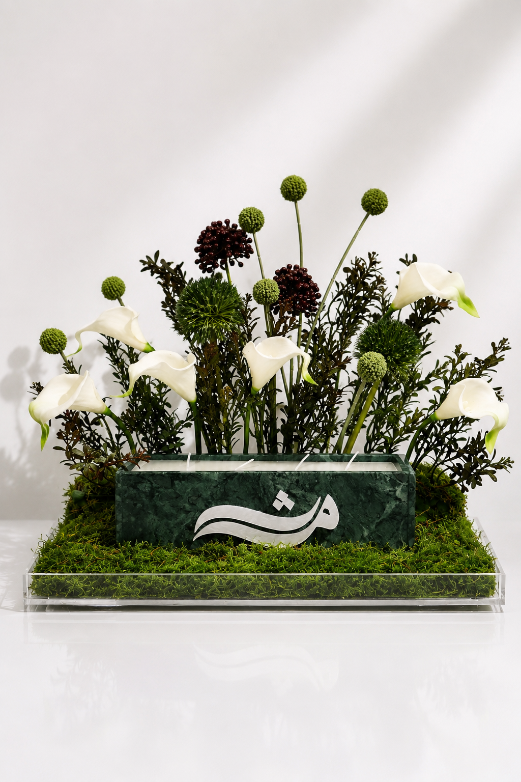 Green marble candle with arrangements