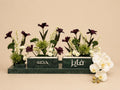 Couples candles with arrangement